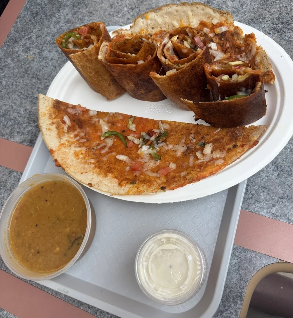 Live dosa preparation on tawa at Balaji Dosa Live Edmonton
