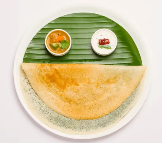 Crispy cone dosa filled with masala at Balaji Dosa Live Edmonton
