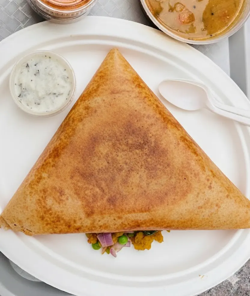 Crispy masala dosa with spiced potato filling at Balaji Dosa Live in Mill Woods Edmonton